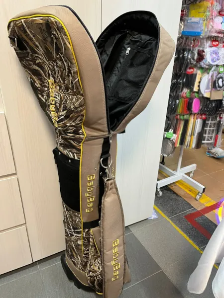 The worn zipper of a brown color golf bag was replaced with a new zipper.