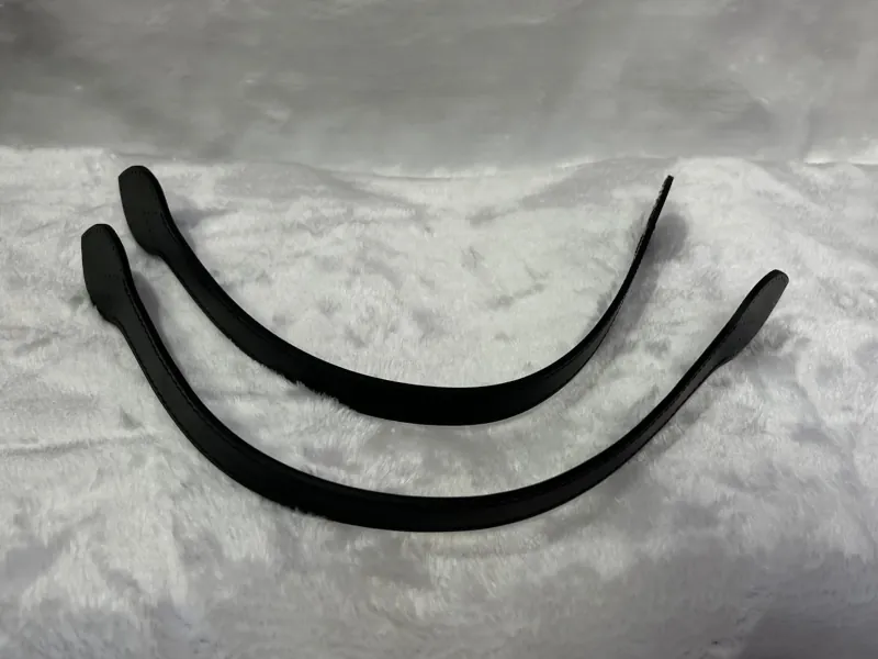 Two black leather straps were used to replace the worn out straps.
