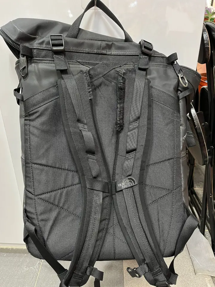 A black color North Face backpack shoulder straps were worn out when the customer sent it in for repair.