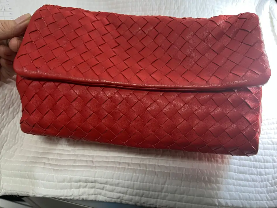 Completed form of the red leather handbag repair.